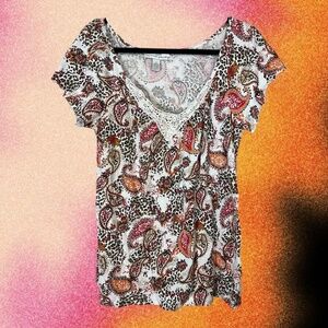 White and multi-coloured paisley print top with lace details and ruffle style sl